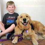 Thai, Genesis Therapy Dog In Training, with her buddy Dylan at Shop For A Cause - Macy's CityPlace.