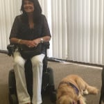 Janice and her service dog, Mysti, as they prepare for a presentation by Genesis Assistance Dogs, Inc.