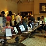 Golfers shopping the silent auction and raffle
