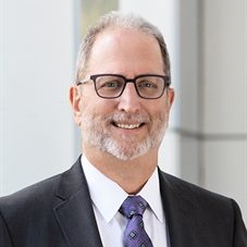 Smiling man in a suit and tie
